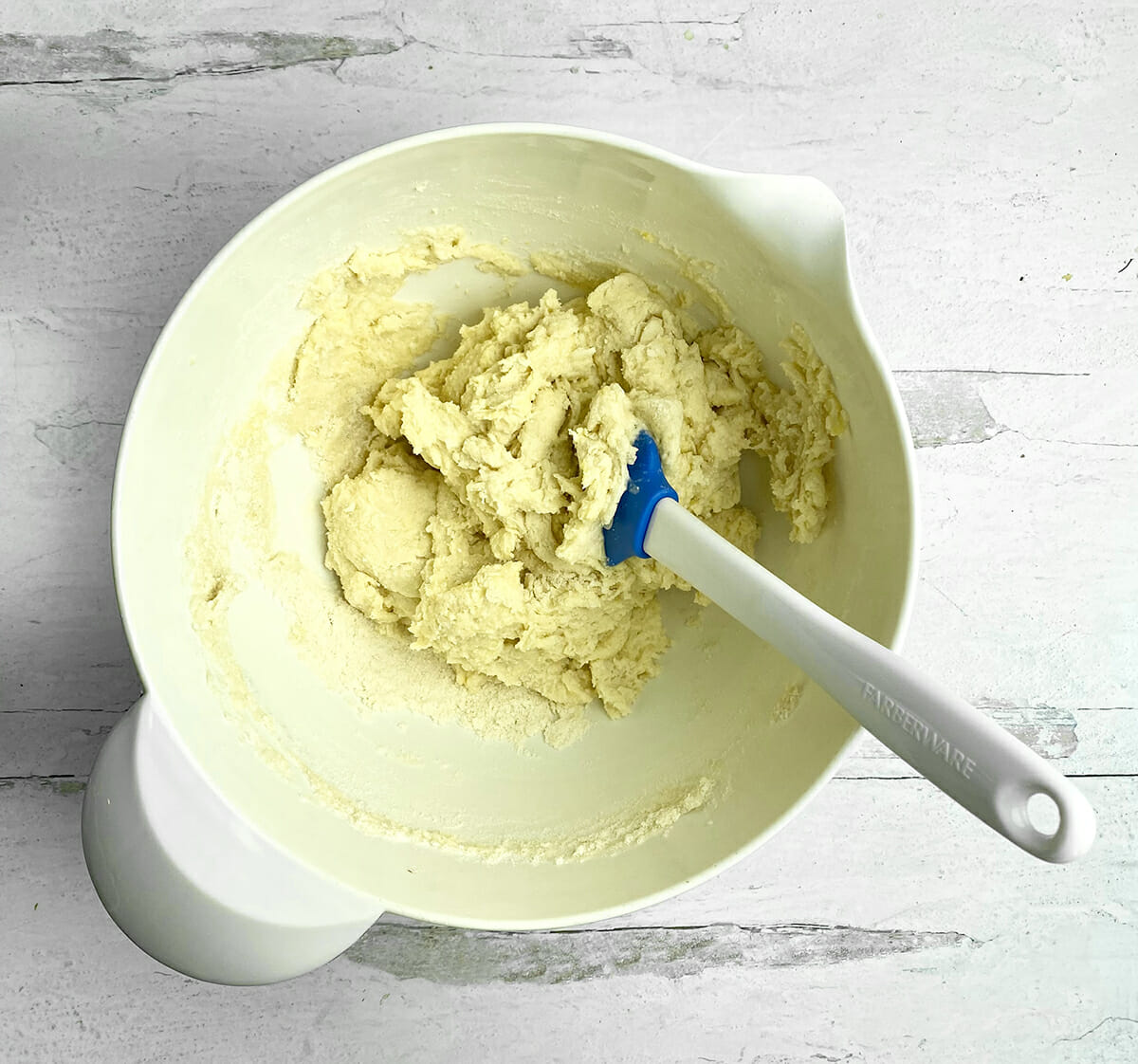 Jam cake batter in a mixing bowl.