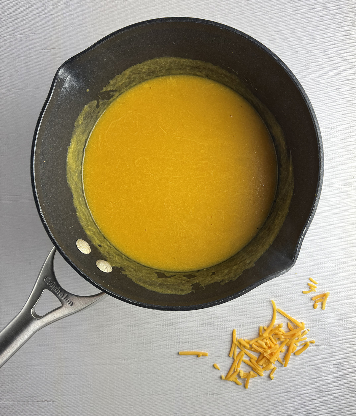 Butternut soup with cheddar cheese.