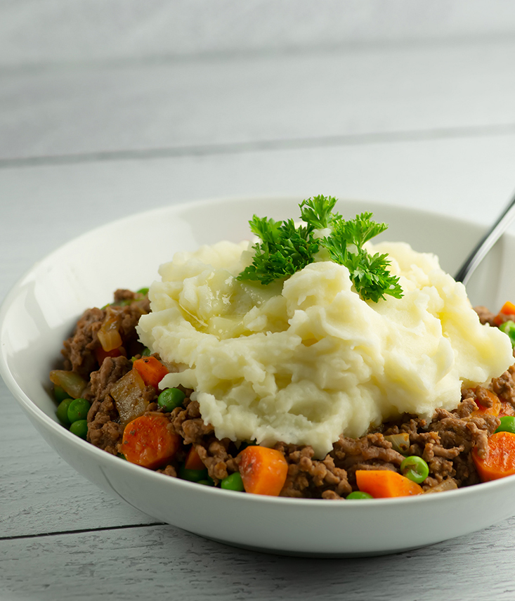 Skillet shepherd's pie in a bowl with a fork.