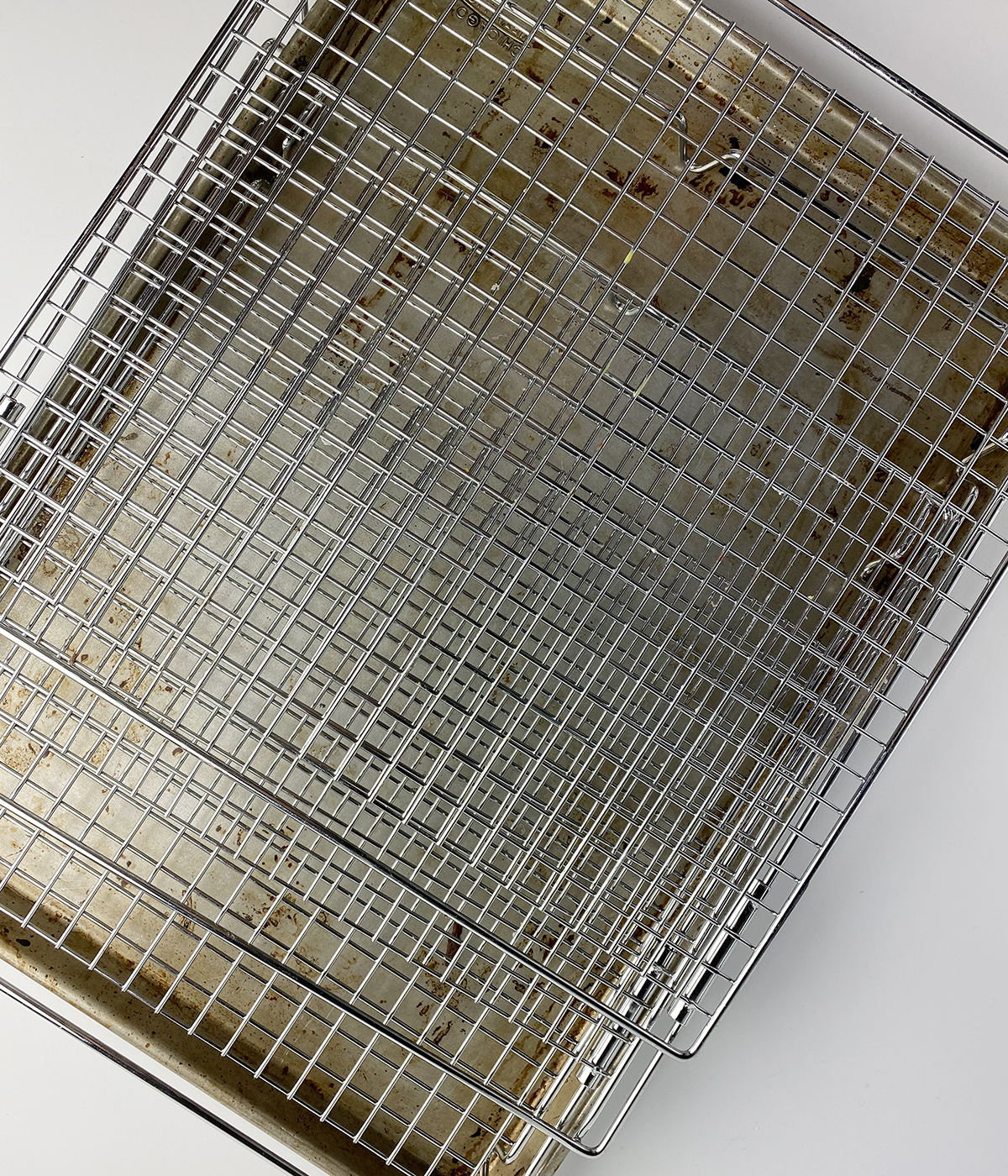 Cooling rack on top of a rimmed baking sheet.