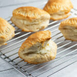 Cream cheese Stuffed Biscuits on a cooling rack.