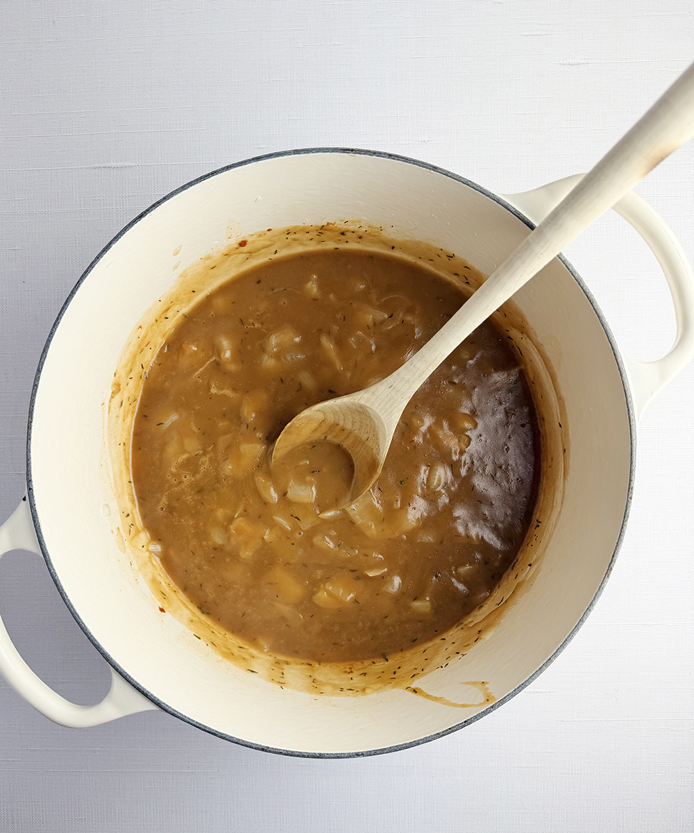 Guiness beef stew sauce in a pot.