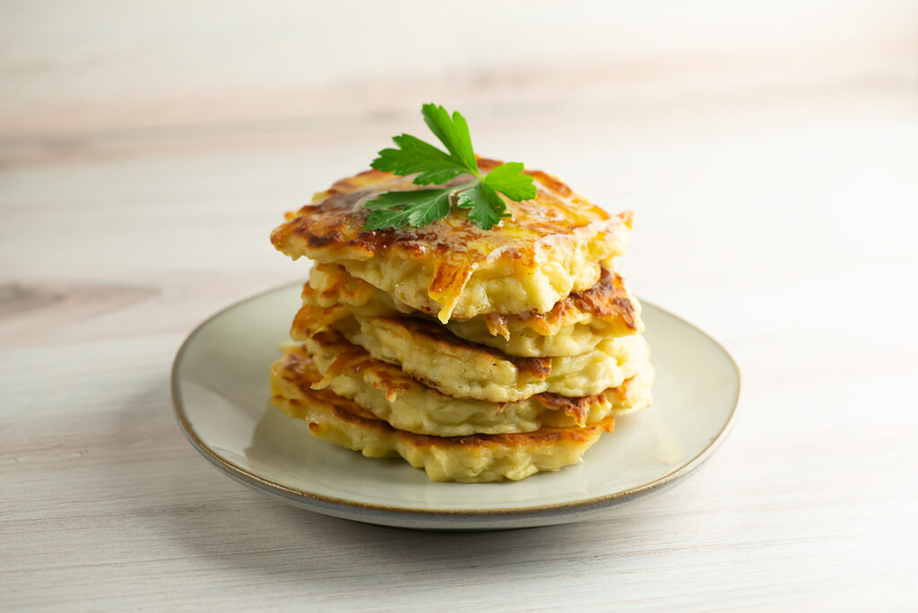 Irish Boxty Potatoes in a stack on a plate.
