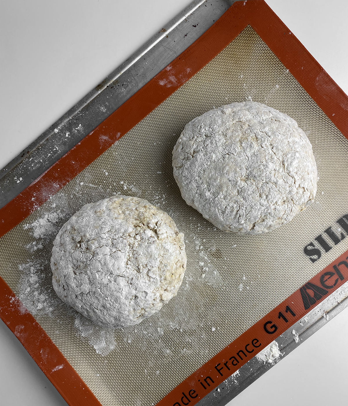 Irish brown bread dough on a cookie sheet.