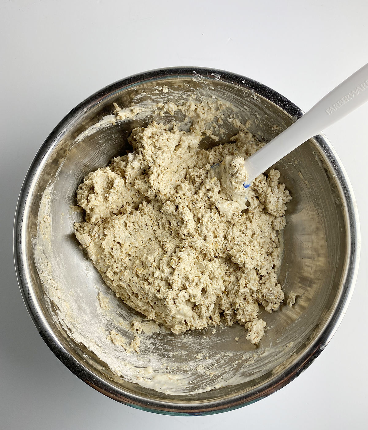 Irish brown bread mixture ina mixing bowl.