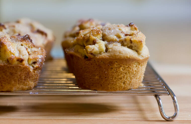 French toast muffins cooling on a rack.