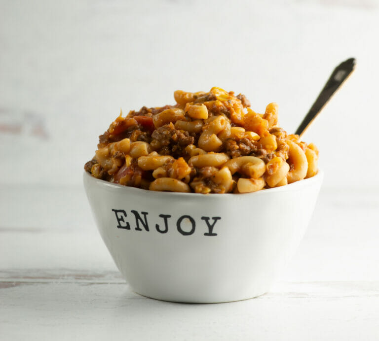 Bowl of Chili Mac with spoon.
