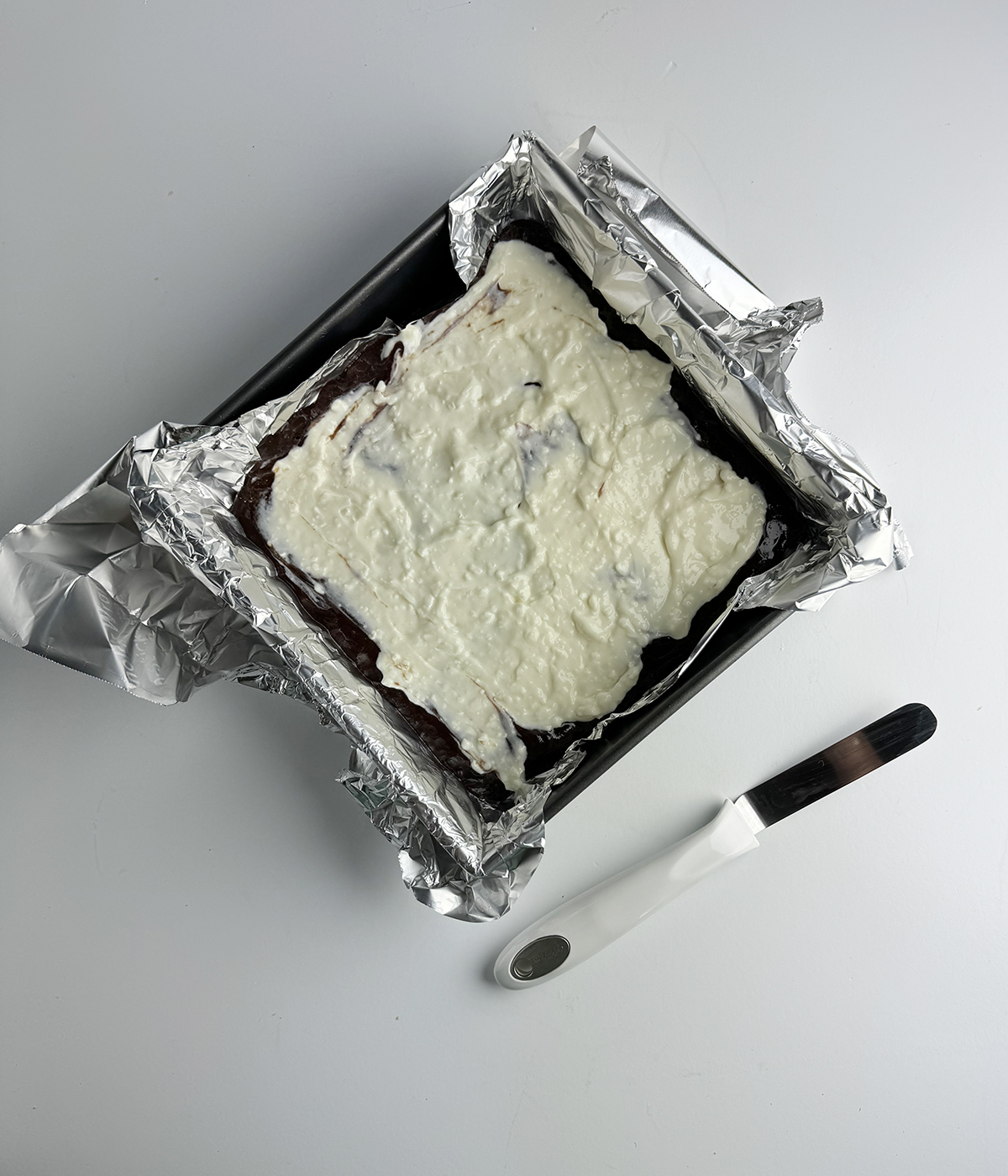 Cheesecake layer of brownie batter.