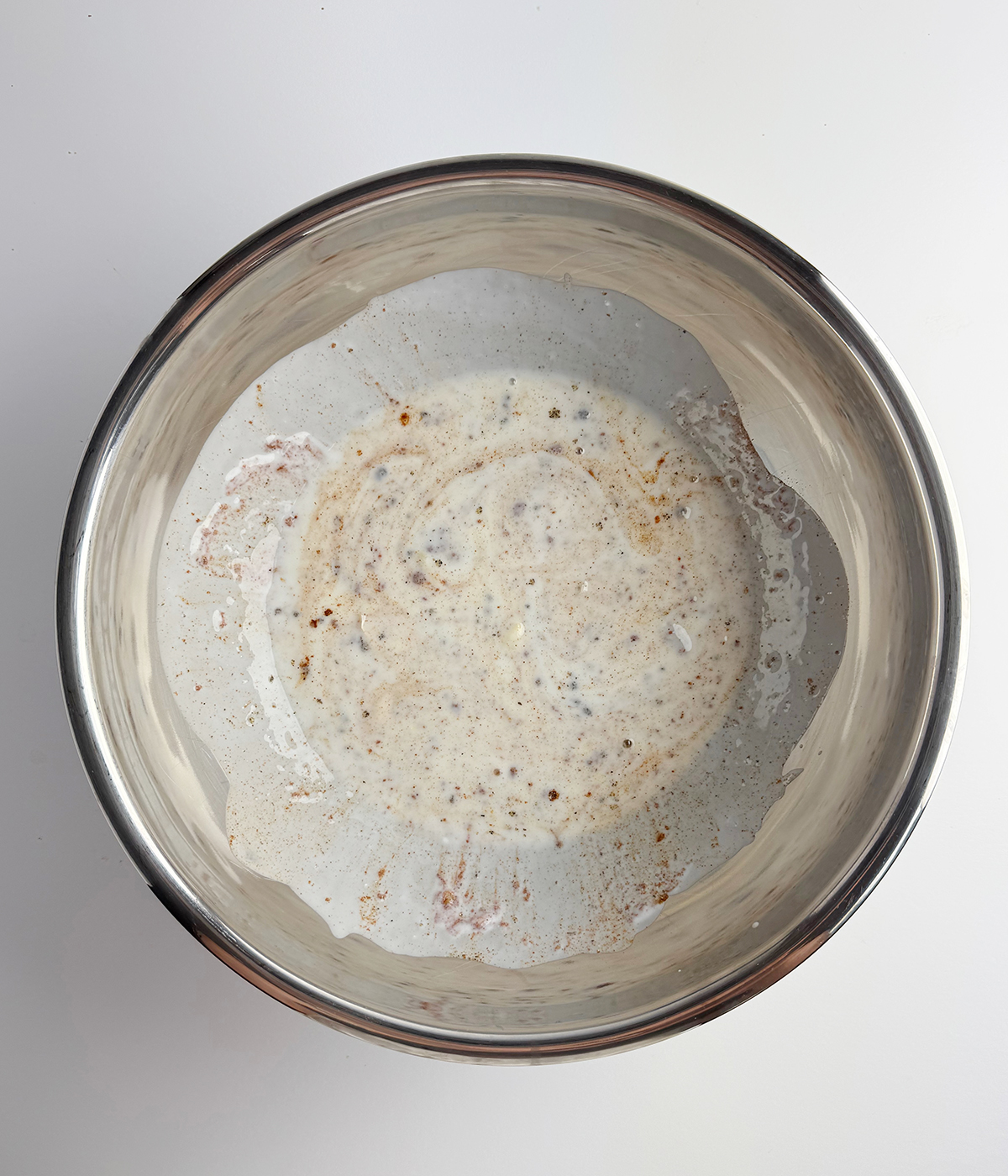 Buttermilk marinade in a bowl.