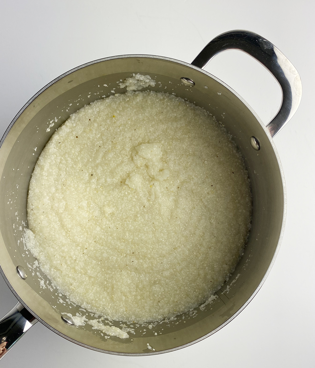 Cooked grits in a pot.