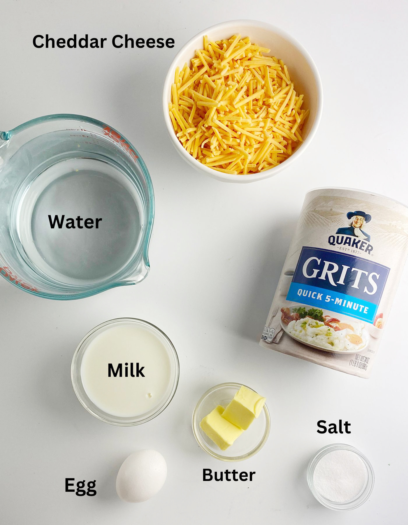Ingredients needed for Cheesy Grit Cakes.