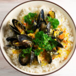 Mussels in Blue Cheese Sauce in a Bowl.
