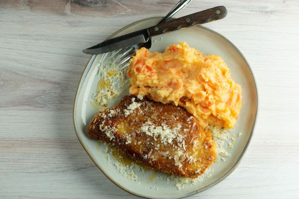 fried parmesan chicken on plate