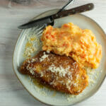 fried parmesan chicken on plate