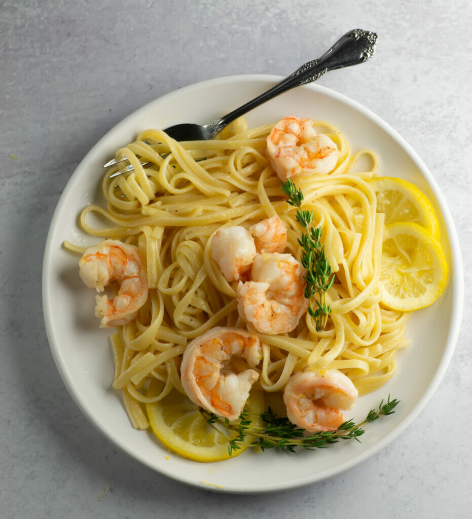 Lemon Shrimp Scampi Pasta on a plate with a fork.