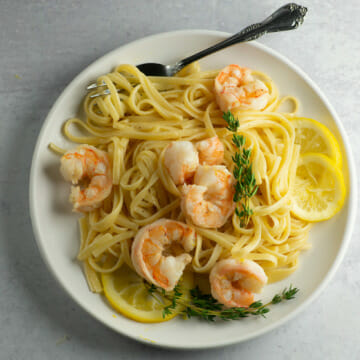 Lemon Shrimp Scampi Pasta on a plate with a fork.