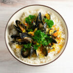 mussels in blue cheese sauce in bowl