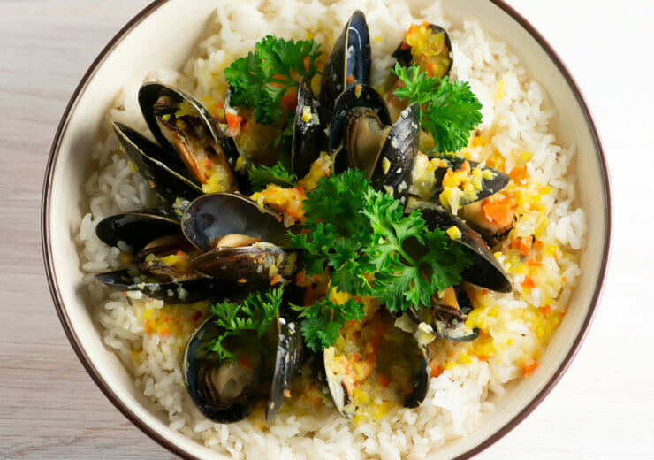 mussels in blue cheese sauce in bowl