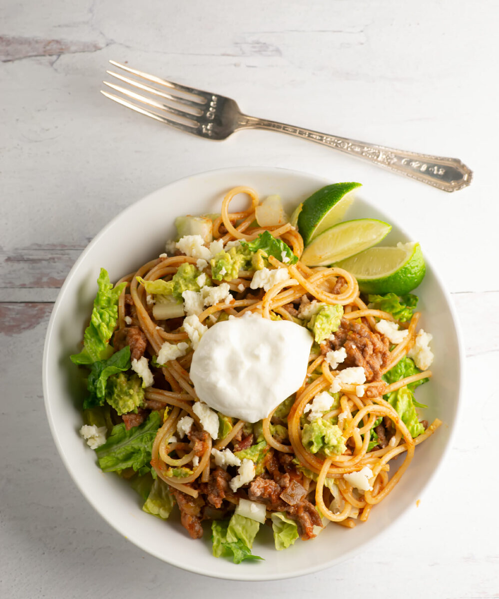 Taco pasta bowl with fork.