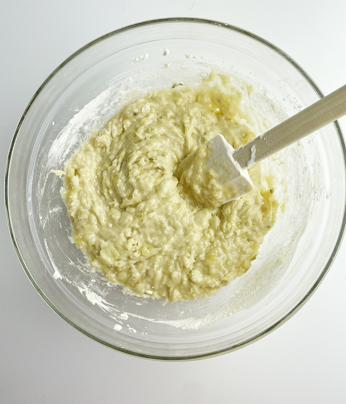 Banana muffin batter in a bowl.