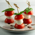 Caprese skewers on a plate ready to serve.