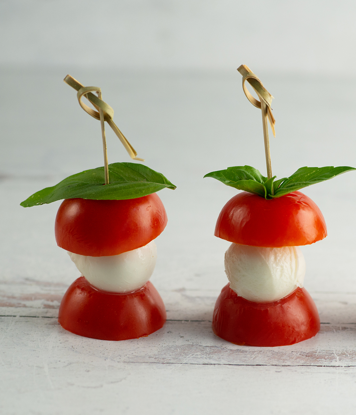 Caprese skewers on toothpicks.