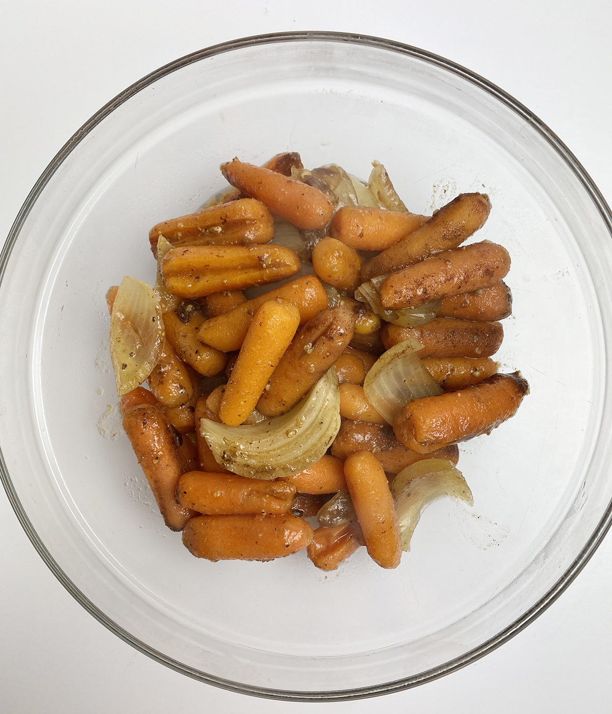 Cooked pot roast vegetables in a bowl.