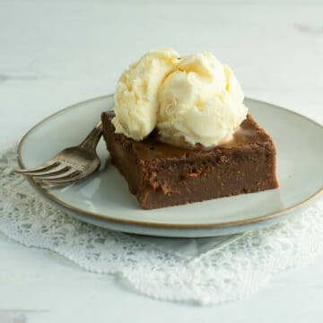 Slice of southern coca-cola cake with ice cream