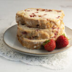 Sliced strawberry bread on a plate.