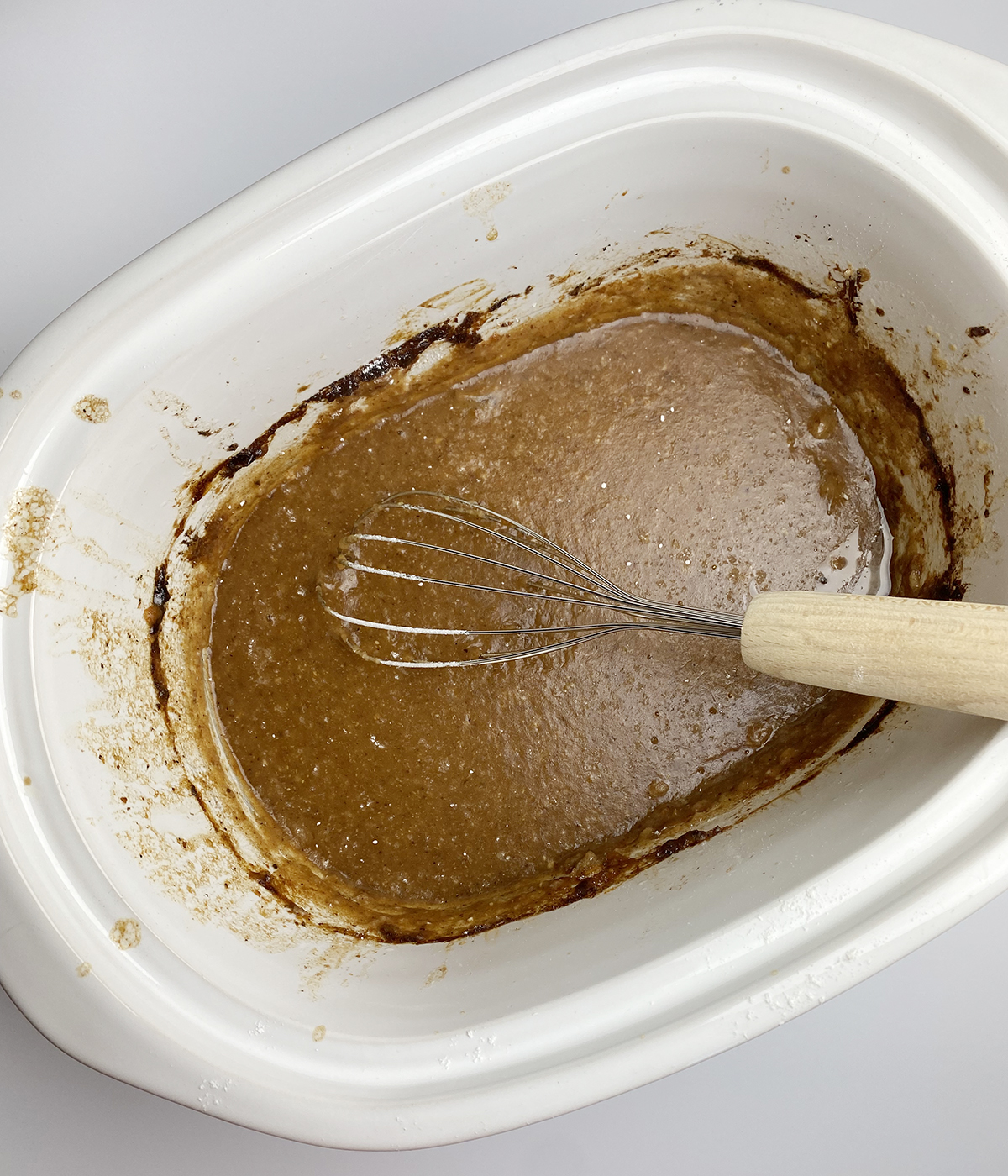 Thickening slow cooker cola pot roast sauce with flour.