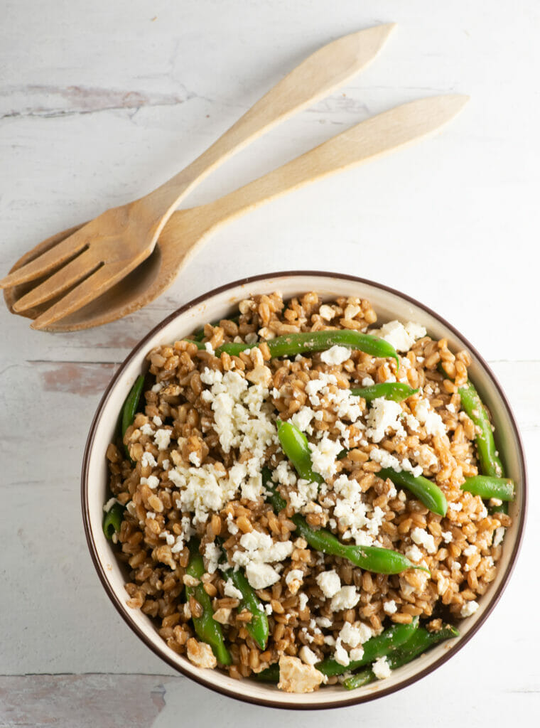 green bean salad with serving utensils