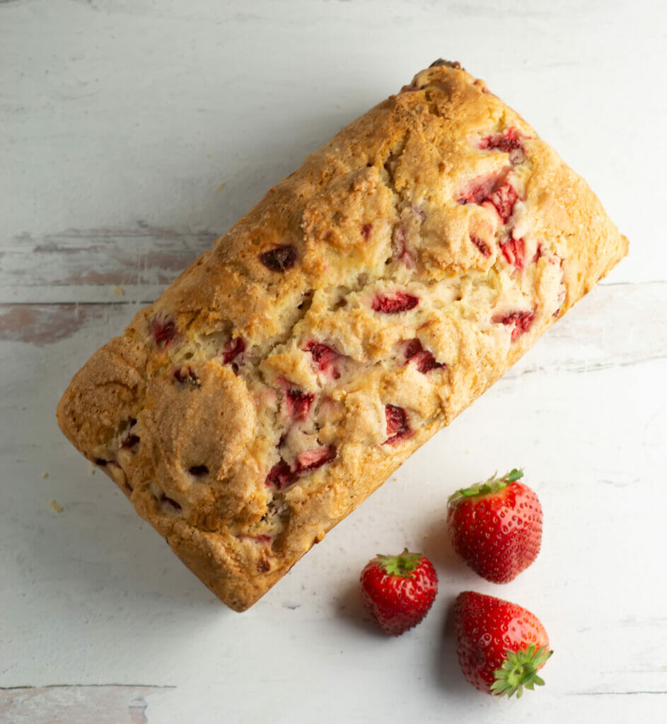 loaf of strawberry bread with strawberries