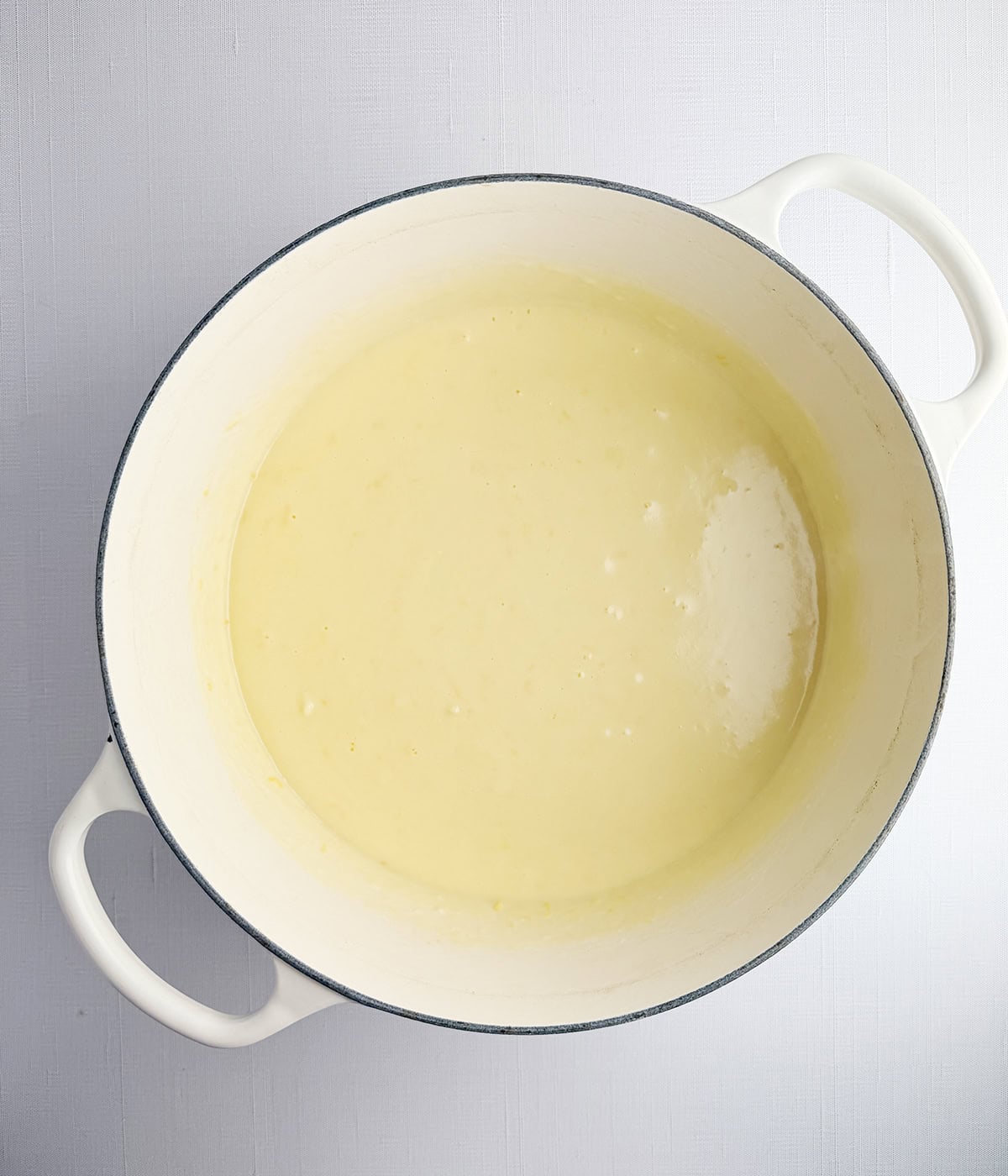 Cheese sauce in a pot.