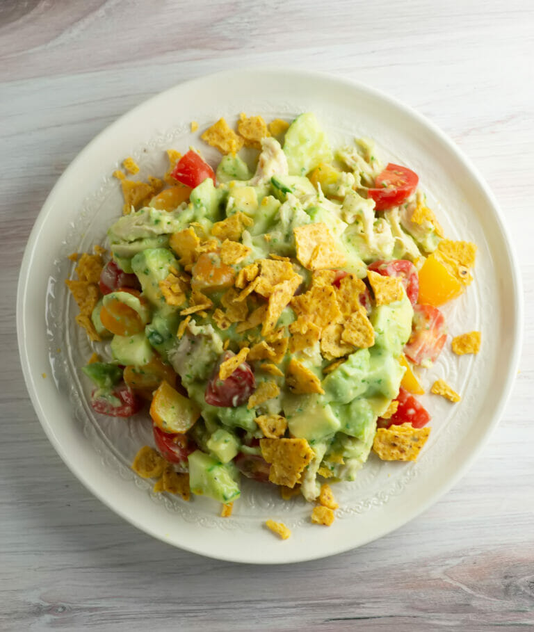 Easy avocado chicken salad on a plate.