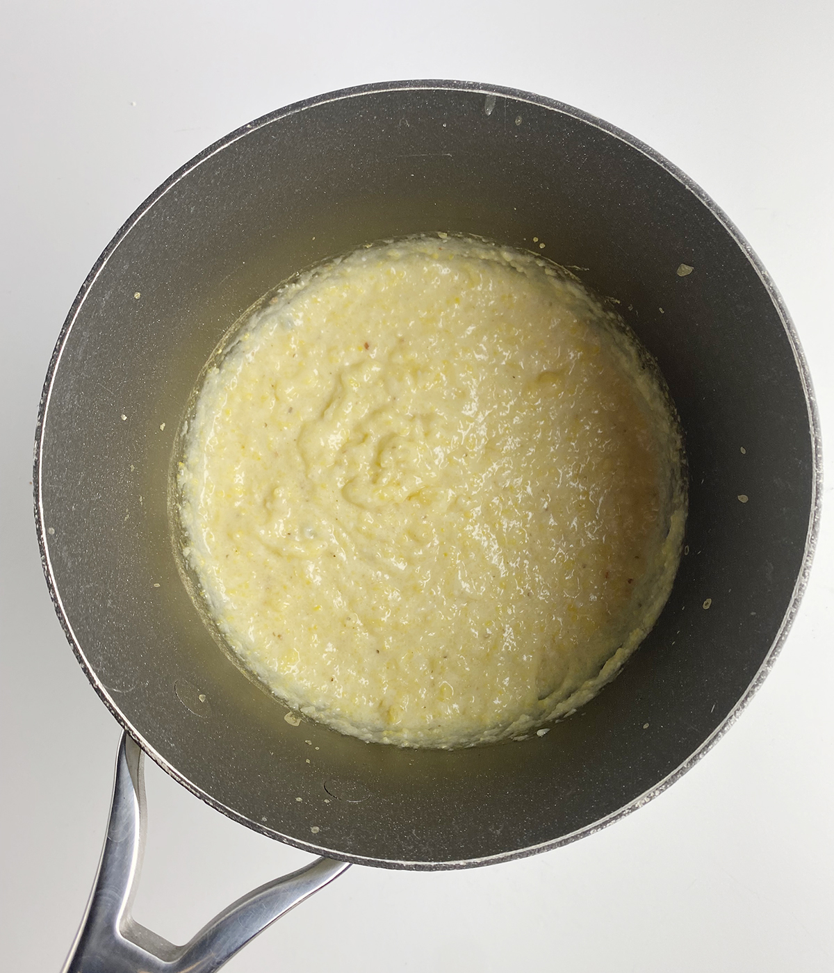 Polenta cooking in a pot.