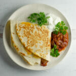 Easy breakfast quesadilla on a plate.