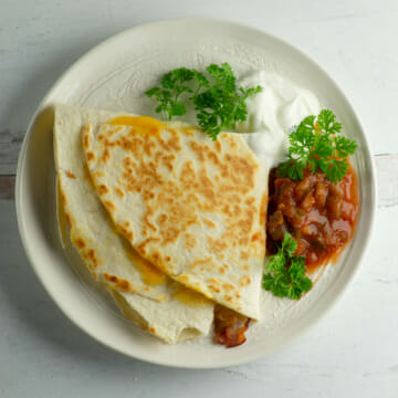 Easy breakfast quesadilla on a plate.