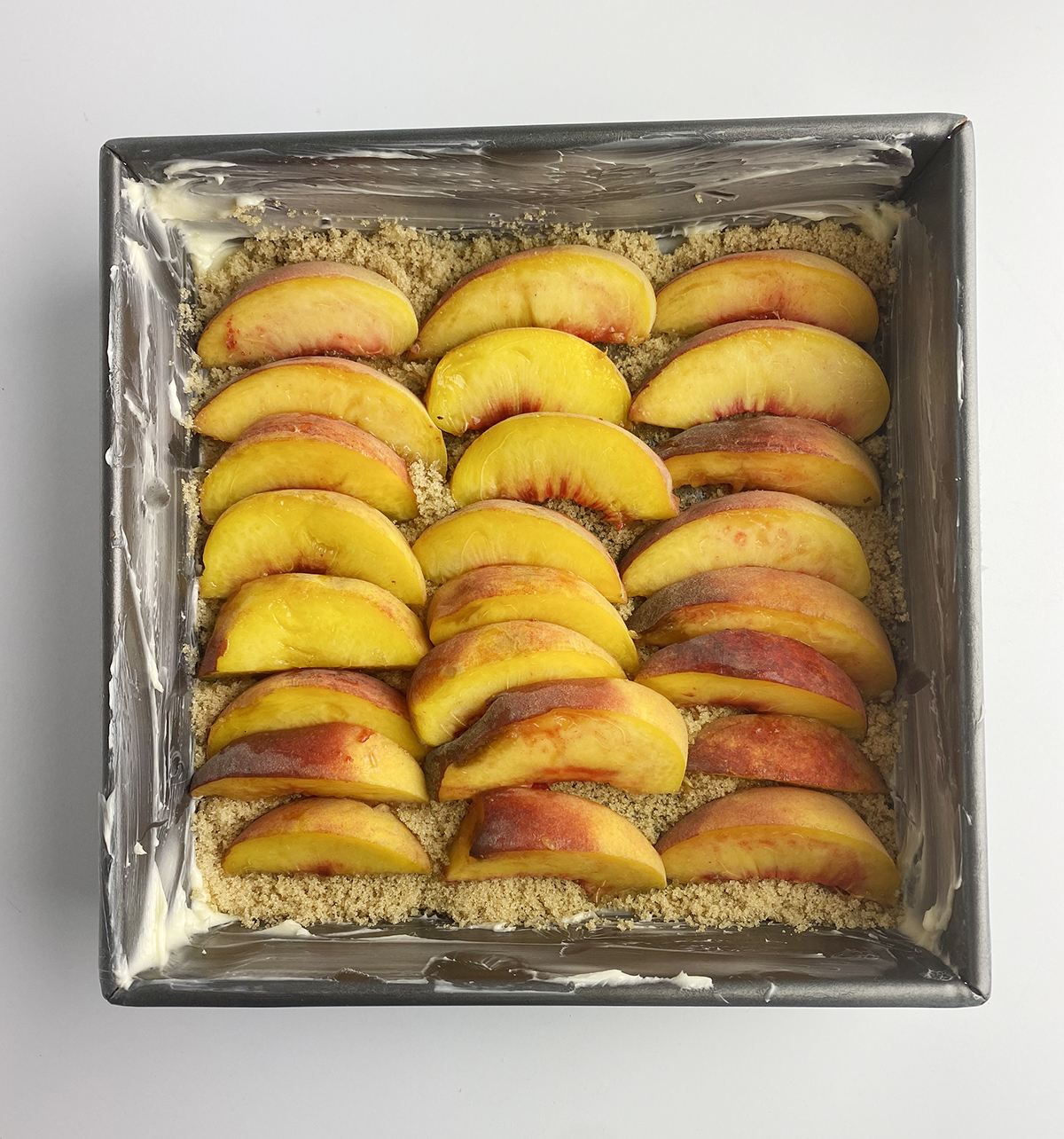 peach slices in pan