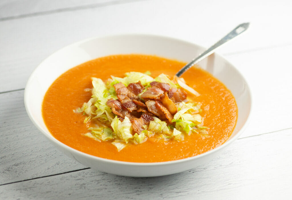 Bacon Lettuce and Tomato Soup in a bowl with a spoon.