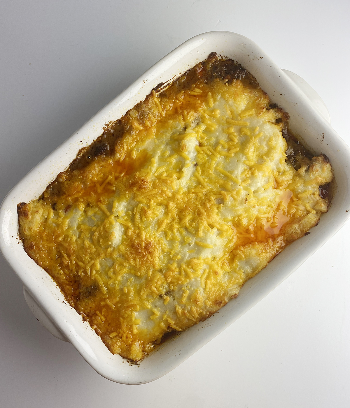 Baked cheesy cottage pie.