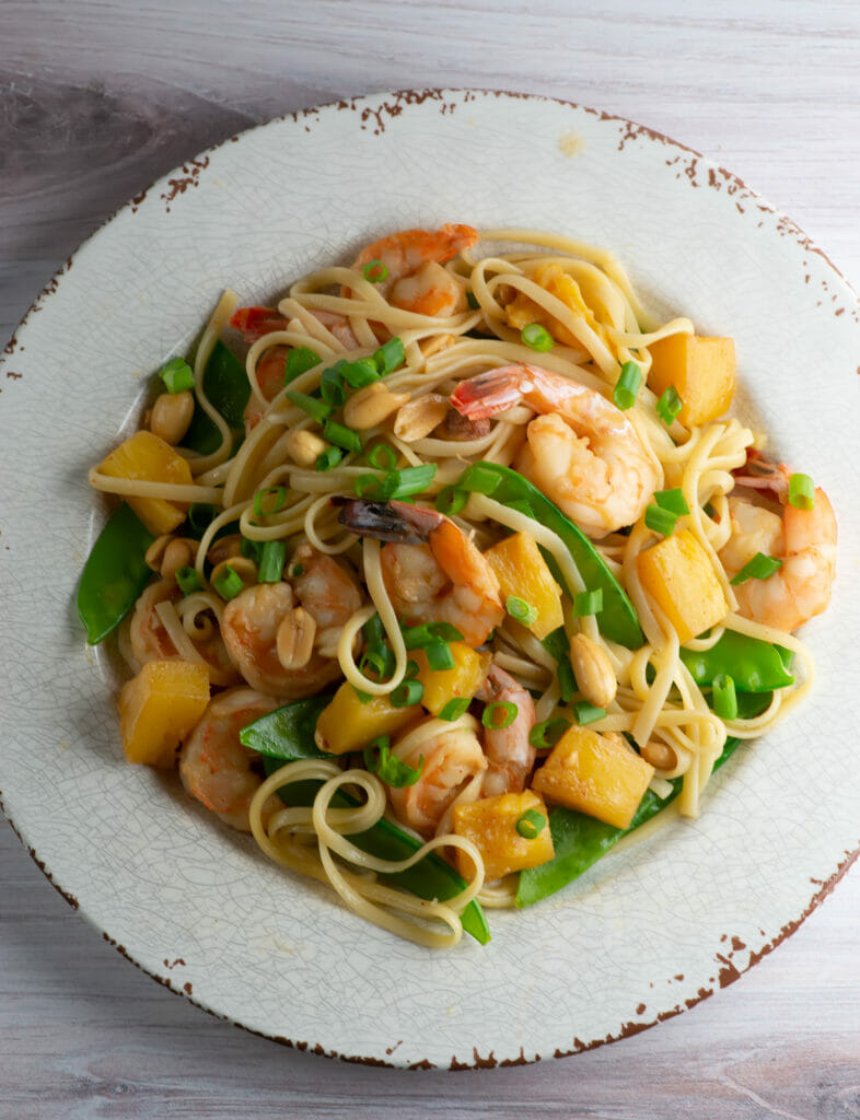 Pineapple shrimp noodles in a bowl.