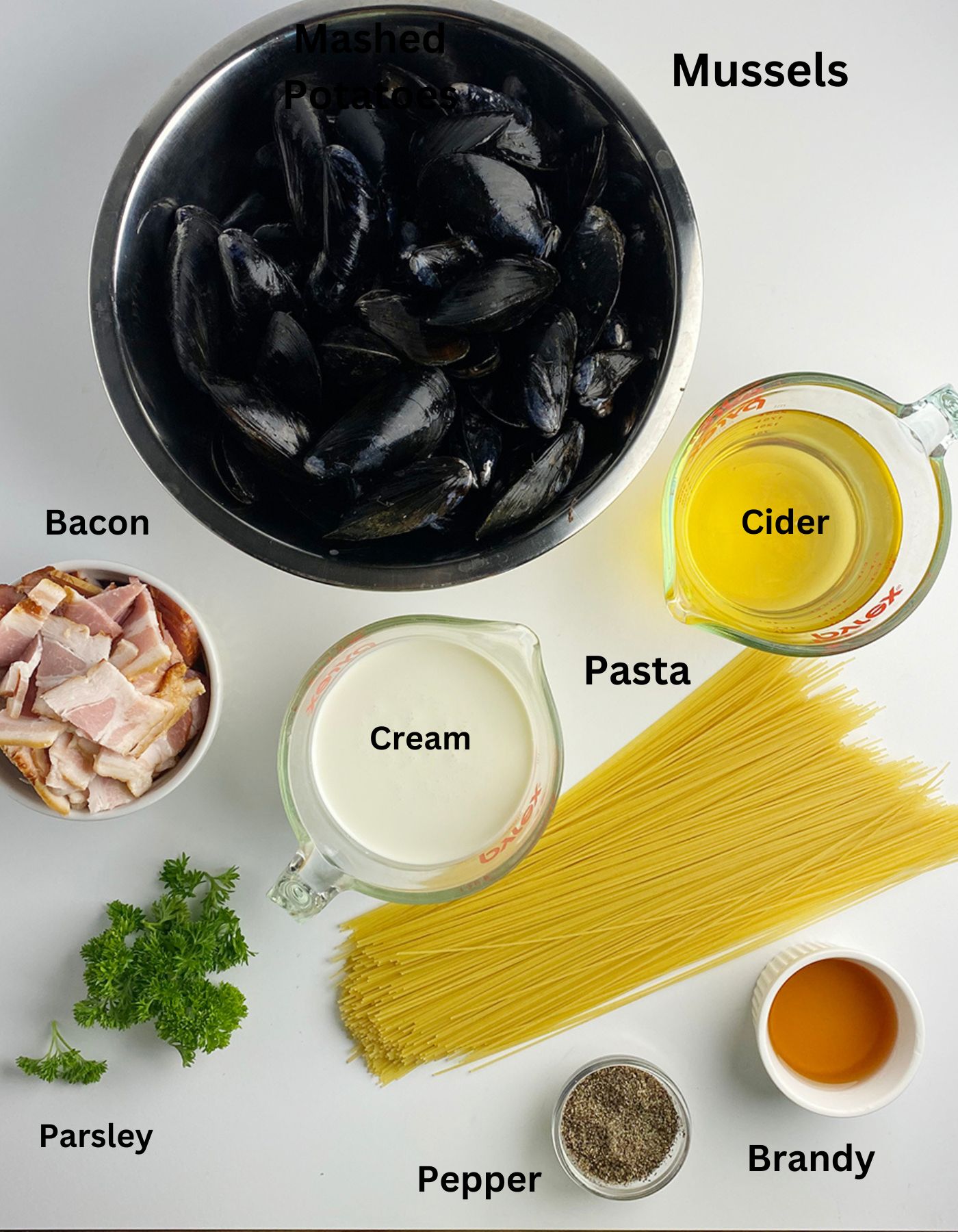 Ingredients you need to make mussels in cider.