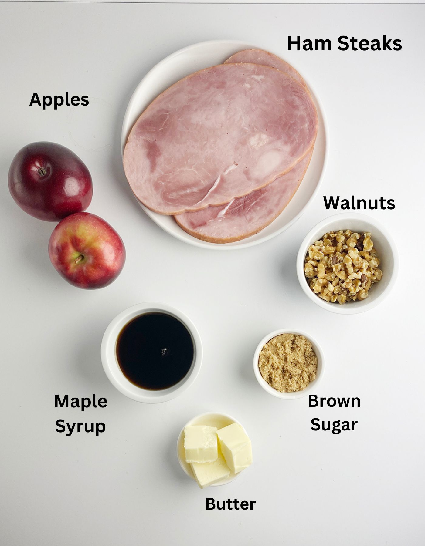 Ingredients needed to make ham steaks with apples.
