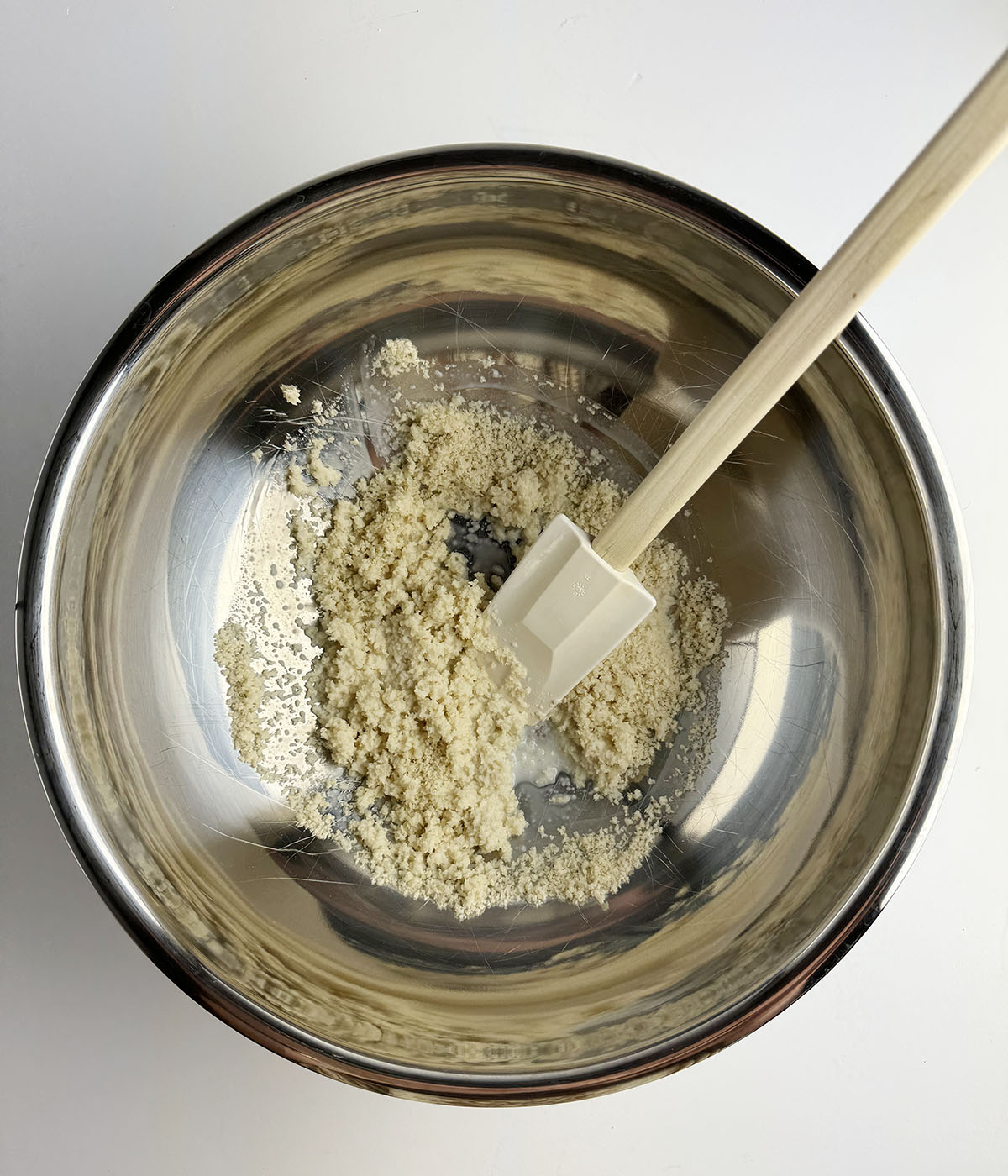Bread crumb mixture in a mixing bowl.