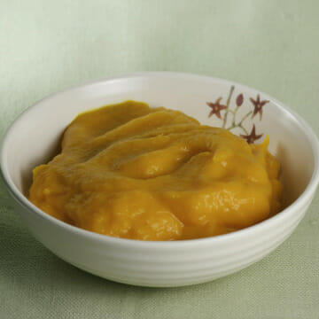 Creamy whipped carrots in a bowl.