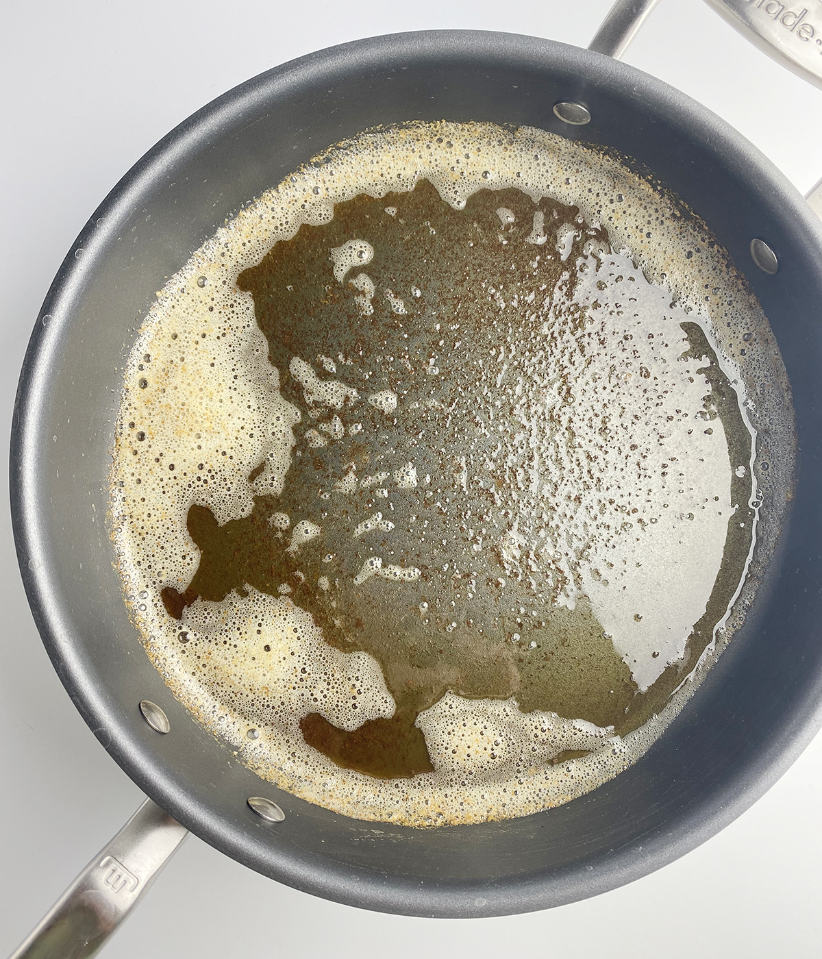 Brown butter in a skillet.