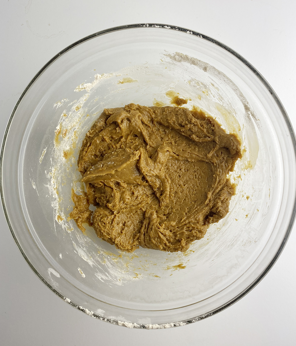 Gingerbread pancake batter in a mixing bowl.