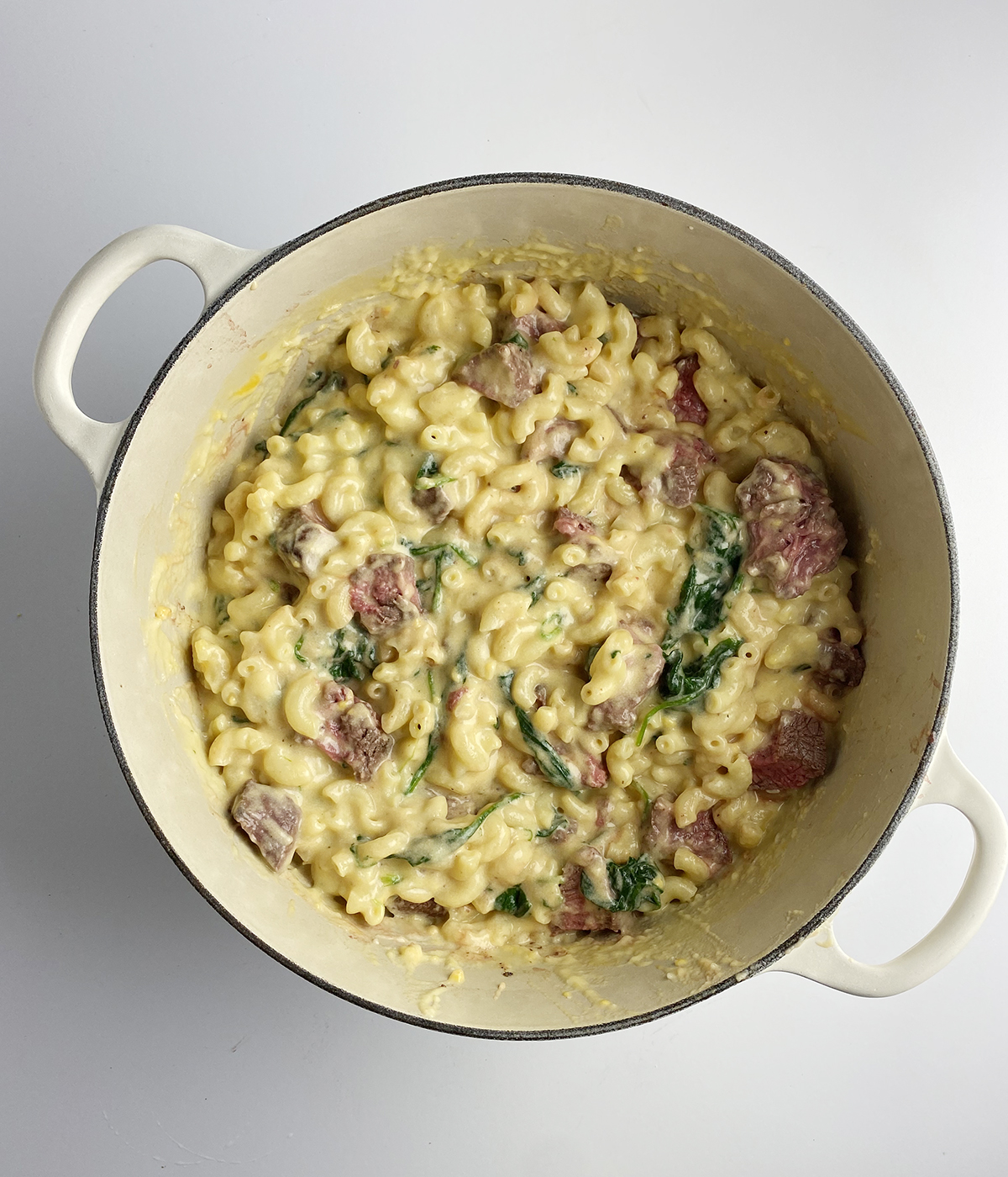 Steakhouse macaroni and cheese in a Dutch Oven.