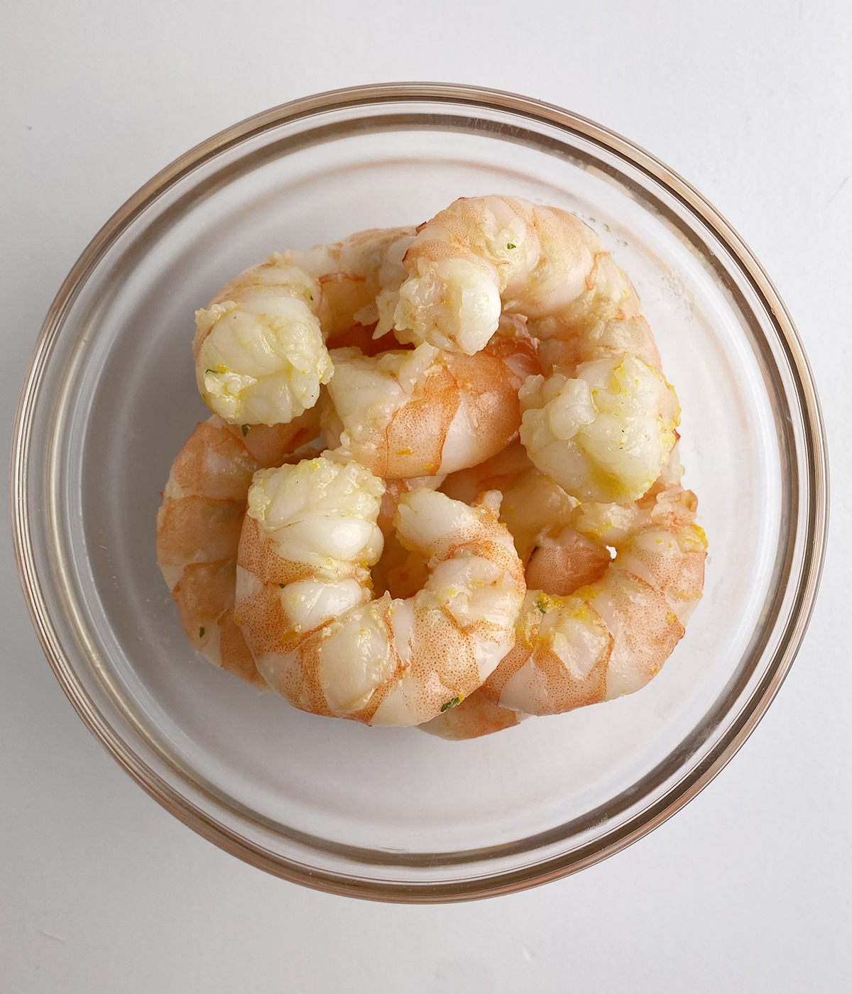 Cooked and cooled shrimp in a bowl.