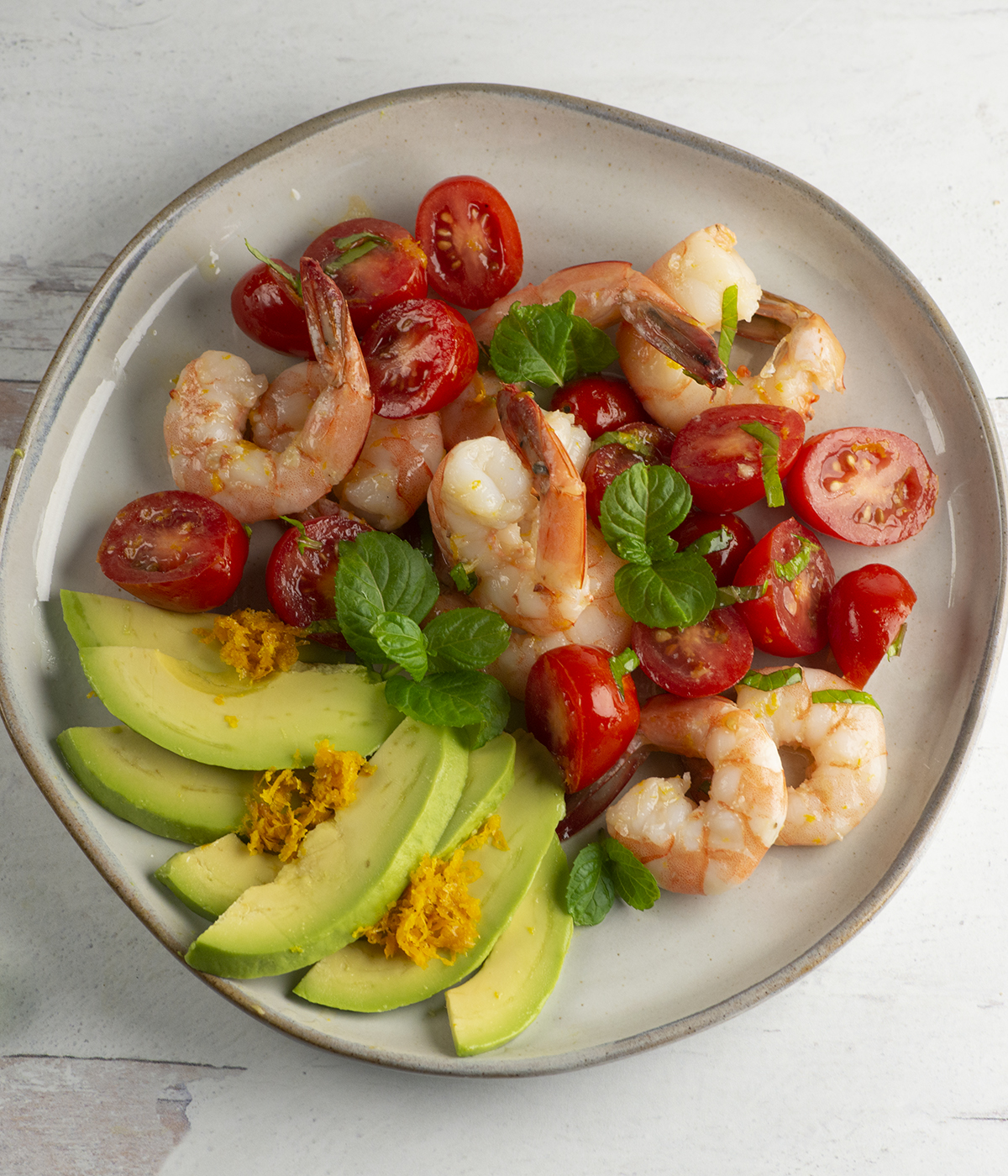 Orange Avocado Mint Shrimp Salad on a plate.